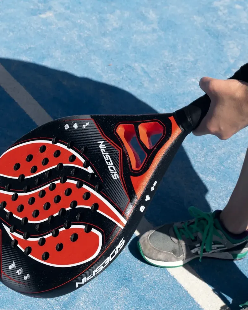 Player holding a padel racket